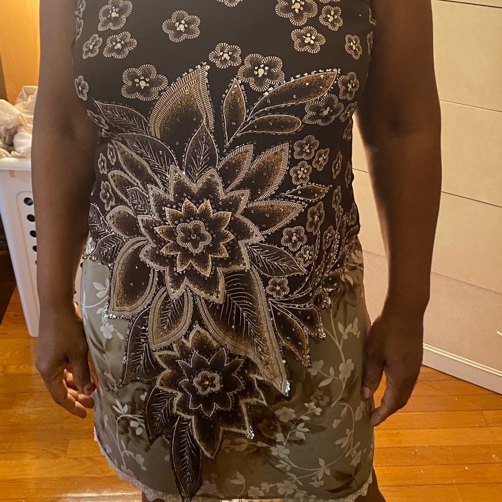 Beautiful long flower shirt.